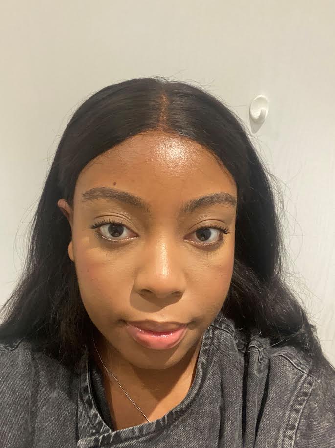 A Black young woman with long hair