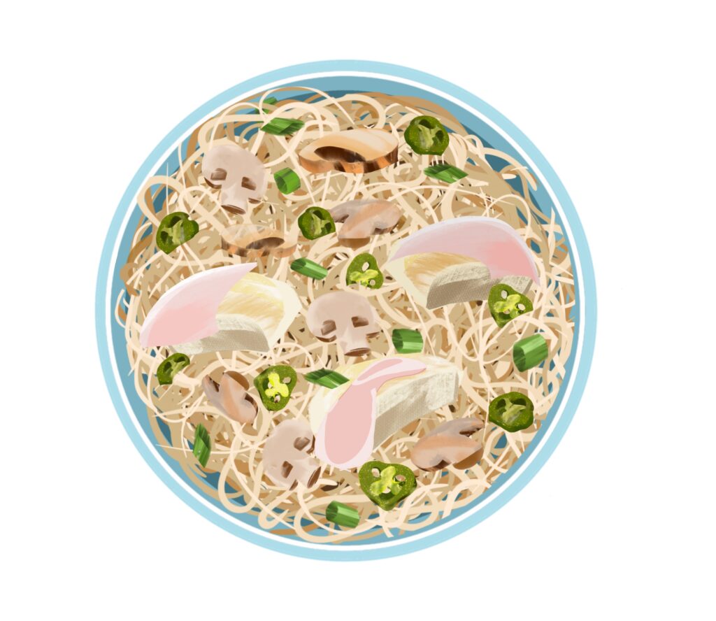 noodles in a blue rimmed bowl with pink fish wrapped in bacon slices and spring onions